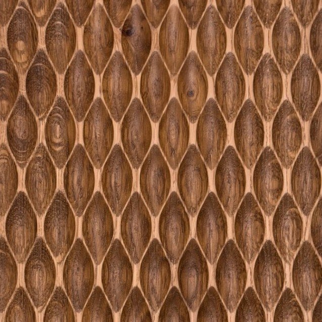 Carved walnut panel with a three-dimensional lens relief pattern